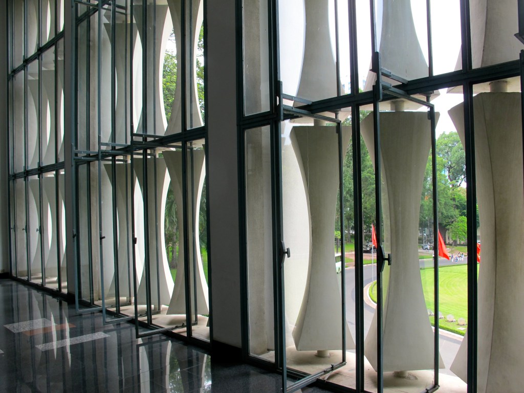An interior hallway at Reunification Palace shows the facade's bamboo design. (Photo by Nissa Rhee, June 2014)