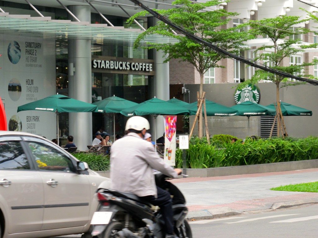 Starbucks -- which entered the Vietnamese market last year -- has an outlet across the street from the Reunification Palace, the site of South Vietnamese defeat. (Photo by Nissa Rhee, June 2014)