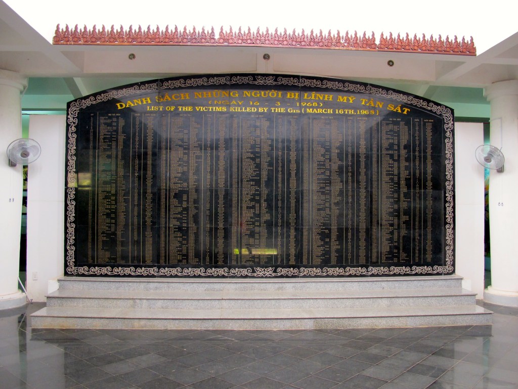 A memorial plaque in the My Lai museum lists the names of those killed in the massacre. (Photo by Nissa Rhee, June 2014)